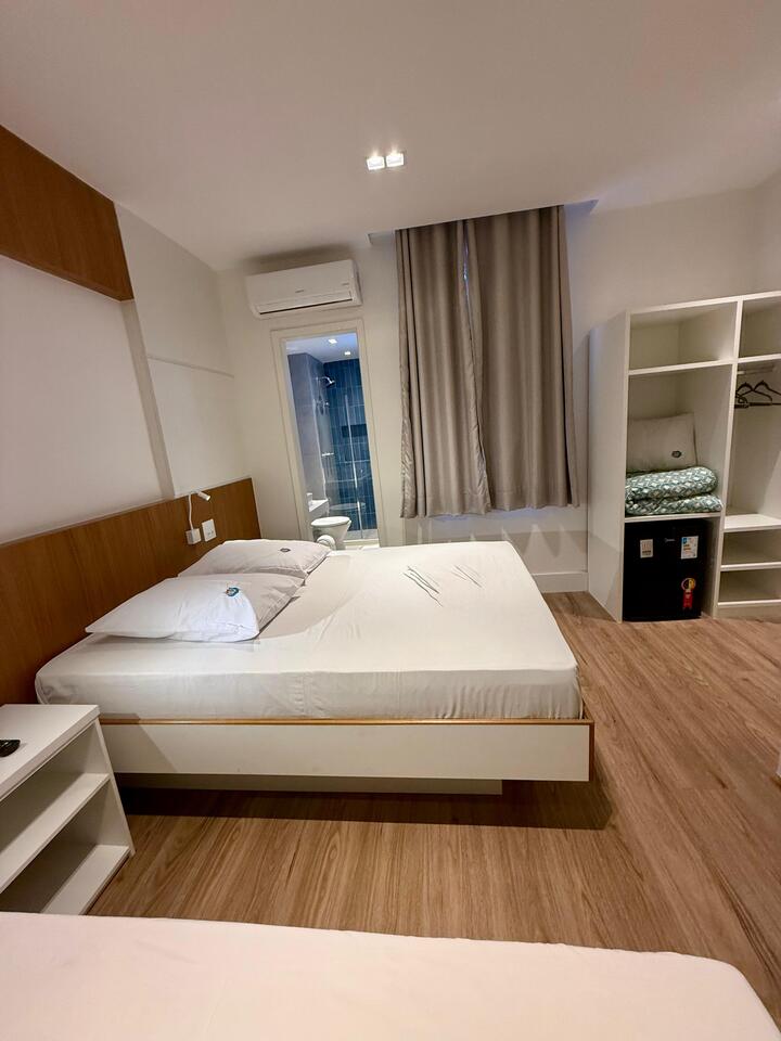 Quarto Triplo Business