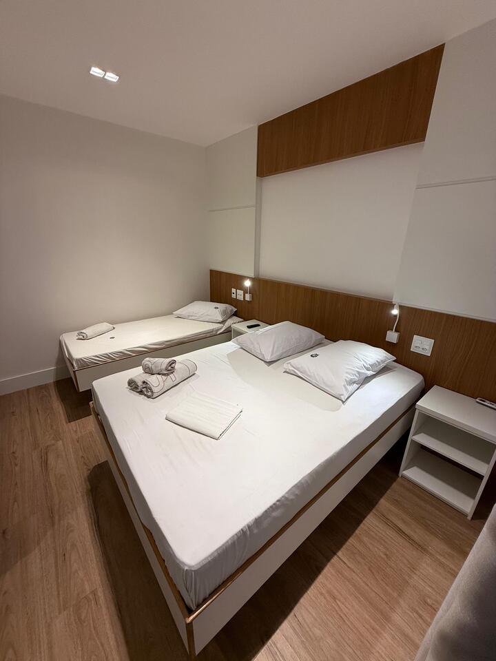 Quarto Triplo Business